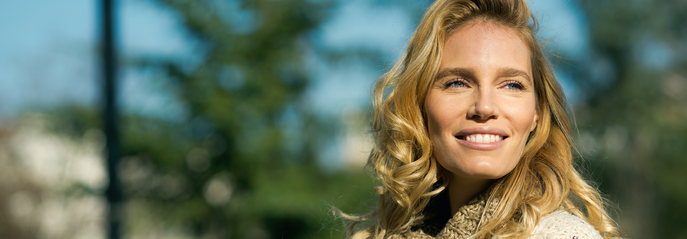 Woman with curly blonde hair